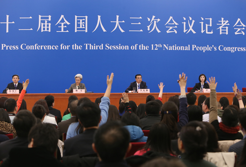 3月15日，國務(wù)院總理李克強在北京人民大會堂與中外記者見面，并回答記者提問。新華社記者 呂迅 攝