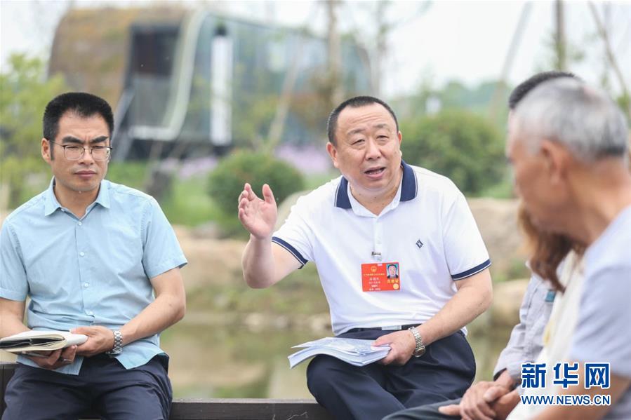 （新華全媒頭條·兩會精神看落實·圖文互動）（2）整體謀劃、系統(tǒng)升級、全面提升——落實全國兩會精神織牢織密公共衛(wèi)生防護網(wǎng)