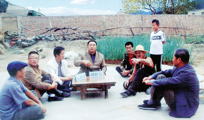 調(diào)解“家長里短，雞毛蒜皮”的小事情是李培斌從事的大事業(yè)