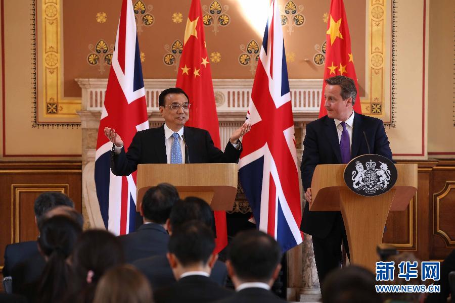 6月17日，國務(wù)院總理李克強同英國首相卡梅倫在倫敦舉行中英總理年度會晤后共同會見記者。新華社記者 龐興雷 攝