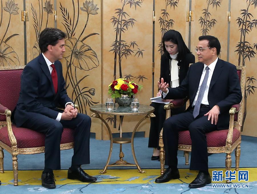 6月18日，國務(wù)院總理李克強(qiáng)在倫敦會(huì)見英國工黨領(lǐng)袖埃德·米利班德。新華社記者 龐興雷 攝