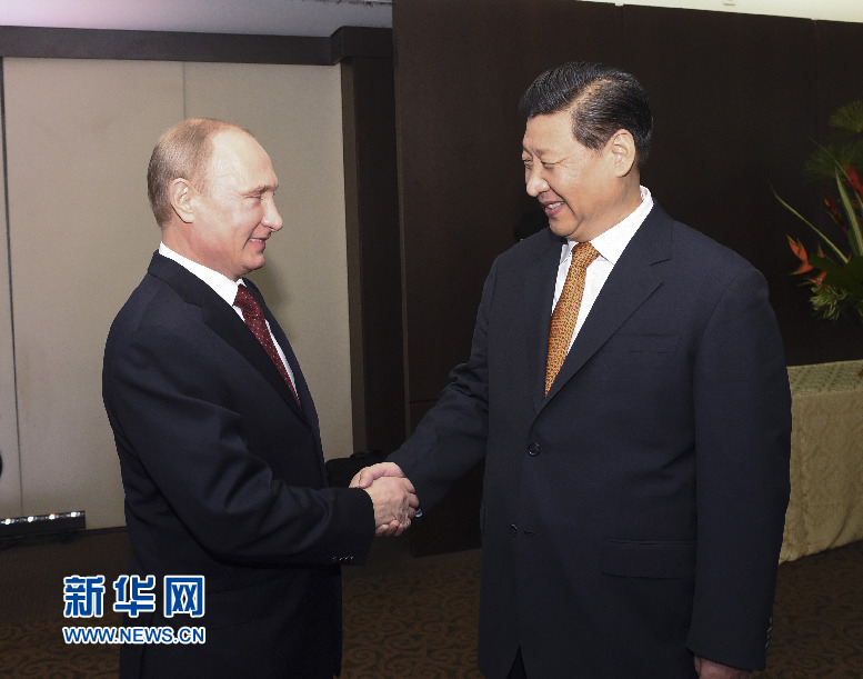 7月14日，國家主席習(xí)近平在巴西福塔萊薩會見俄羅斯總統(tǒng)普京。新華社記者李學(xué)仁攝