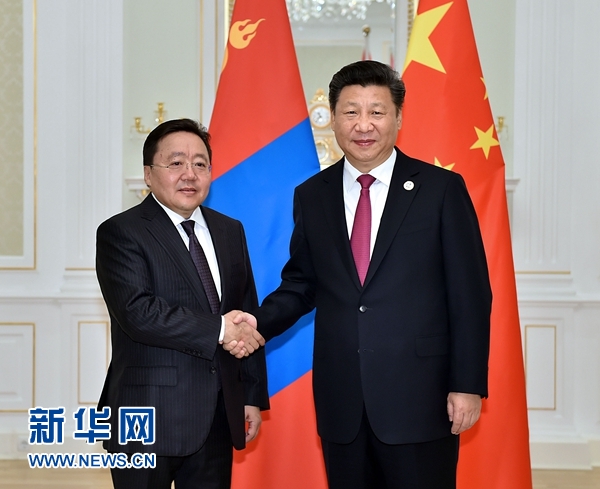 6月23日，國家主席習近平在塔什干會見蒙古國總統(tǒng)額勒貝格道爾吉。 新華社記者李濤攝