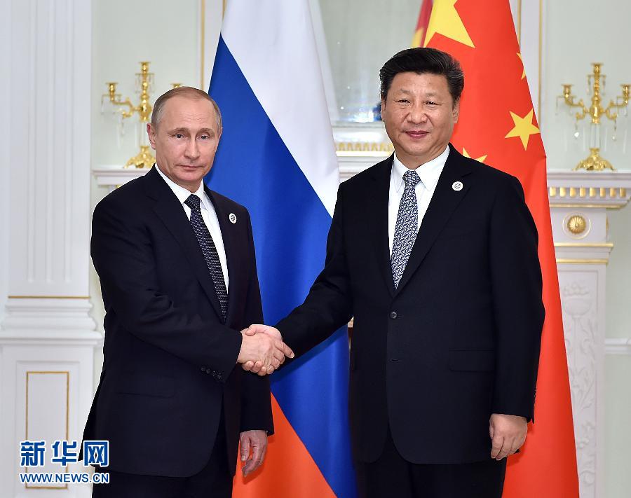 6月23日，國(guó)家主席習(xí)近平在烏茲別克斯坦塔什干會(huì)見(jiàn)俄羅斯總統(tǒng)普京。新華社記者李濤攝